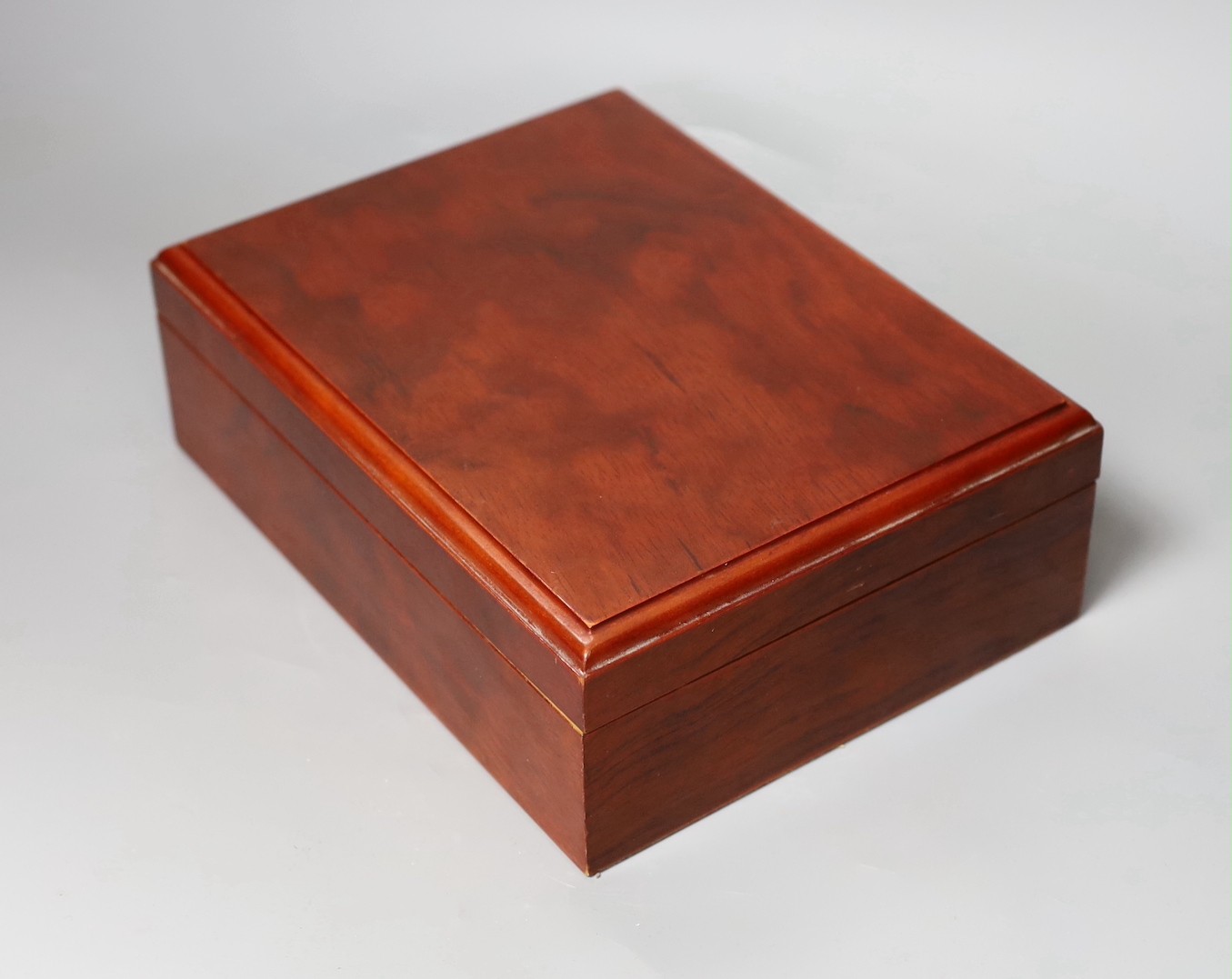 A mahogany humidifer and Dunhill leather cigar case